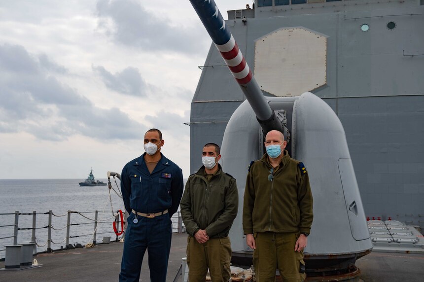 Capt. Joe Bagget, USS Monterey commanding officer, left, and Israel Defense Force naval leadership pose for a photo aboard the Ticonderoga-class guided missile cruiser USS Monterey in the Eastern Mediterranean Sea, March 15, 2021. Monterey is operating with the IKE Carrier Strike Group on a routine deployment in the U.S. Sixth Fleet area of operations in support of U.S. national interests and security in Europe and Africa. (U.S. Navy photo by Mass Communication Specialist Seaman Chelsea Palmer/Released)