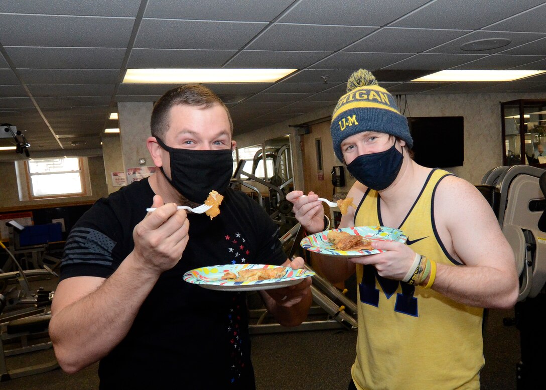 David Potter, left, and Schuyler Slone get ready to enjoy their pie March 12 during the first day of the annual Pi Day event.