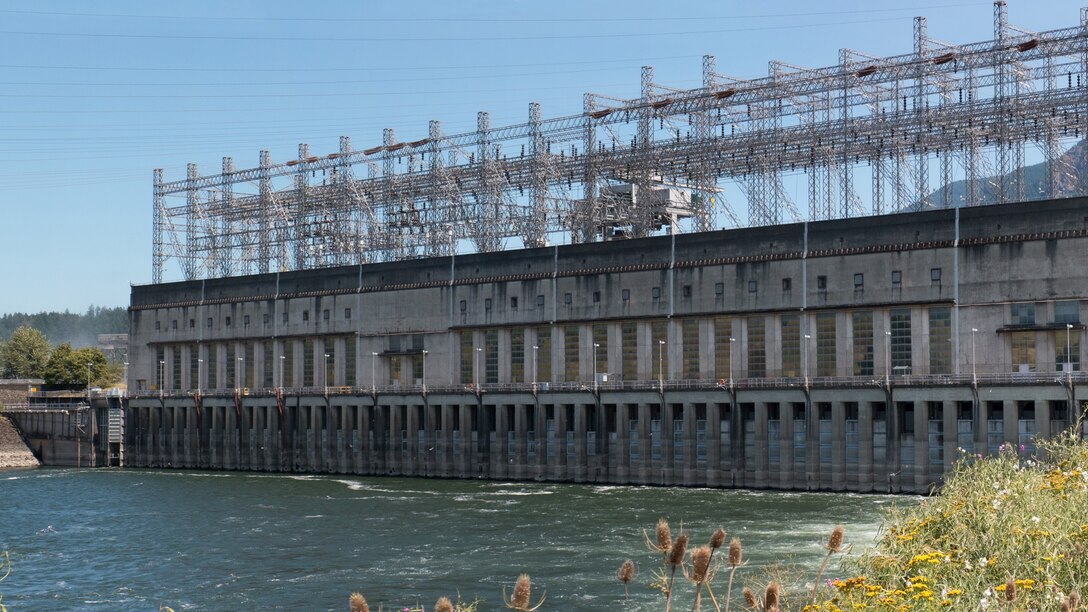 Bonneville Dam Powerhouse 1 is 1,027 feet long and has two 53.4 megawatt and eight 62.1 megawatt generators for a total generating capacity of 603.7 megawatts.  Construction began in 1933 and was completed in 1938 making it the oldest powerhouse in the Federal Columbia River Power System (FCRPS).  Bonneville Dam Powerhouse 2 (not shown) was completed in 1981 and is the newest in the FCRPS.