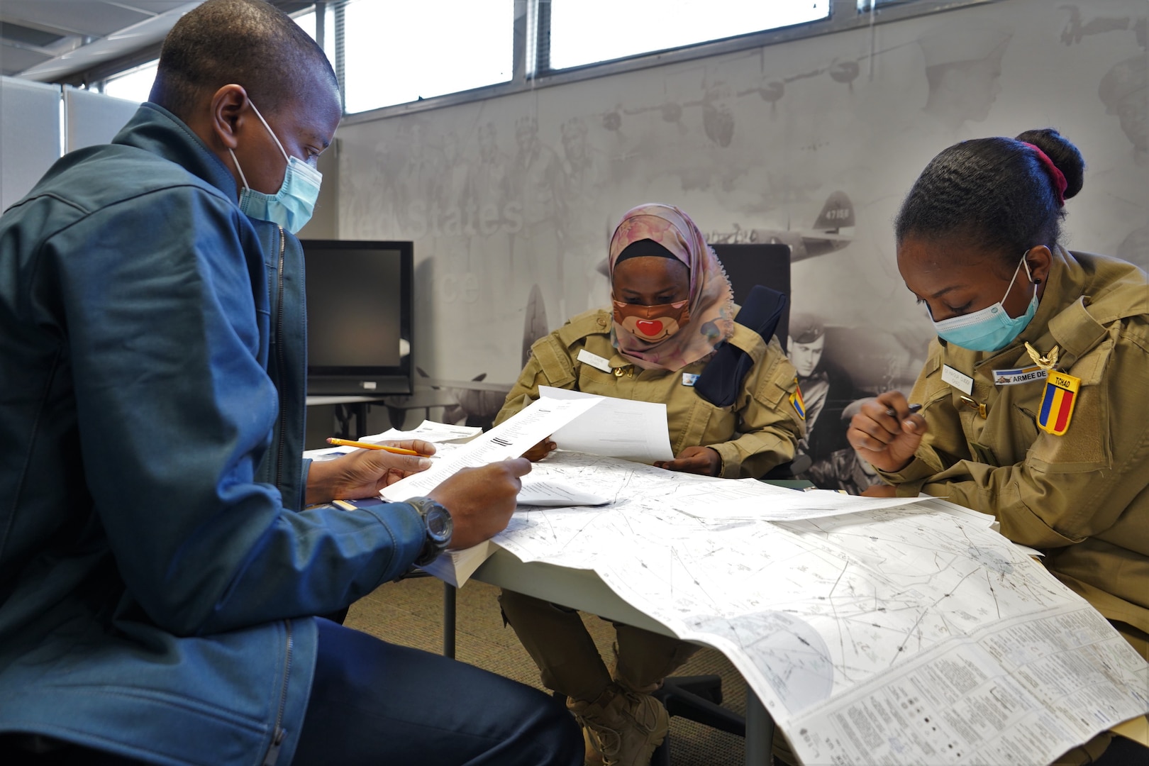 Three Chadian Air Force personnel are the first Defense Language Institute English Language Center students to take advantage of the newest curriculum at DLIELC. This curriculum, pairing the latest virtual reality and artificial intelligence technology, aims to familiarize international students with English communications during aviation scenarios.