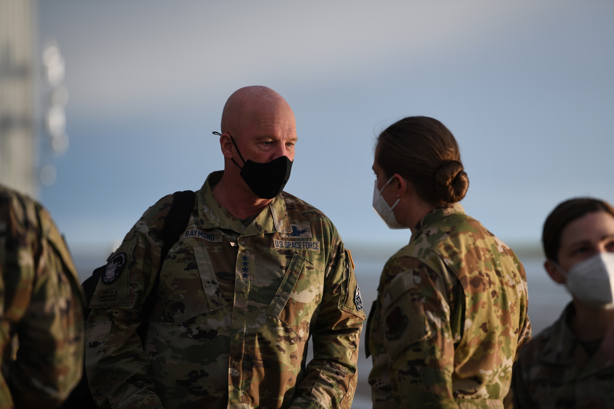 U.S. Space Force Gen. John W. “Jay” Raymond, Chief of Space Operations, left, talks to U.S. Air Force Col. Heather A. Fox, 9th Reconnaissance Wing commander, March 11, 2021, at Beale Air Force Base, California. As the Chief of Space Operations for the U.S. Space Force, Raymond is responsible for the training and equipping of Space Force members. (U.S. Air Force photo by Airman 1st Class Luis A. Ruiz-Vazquez)