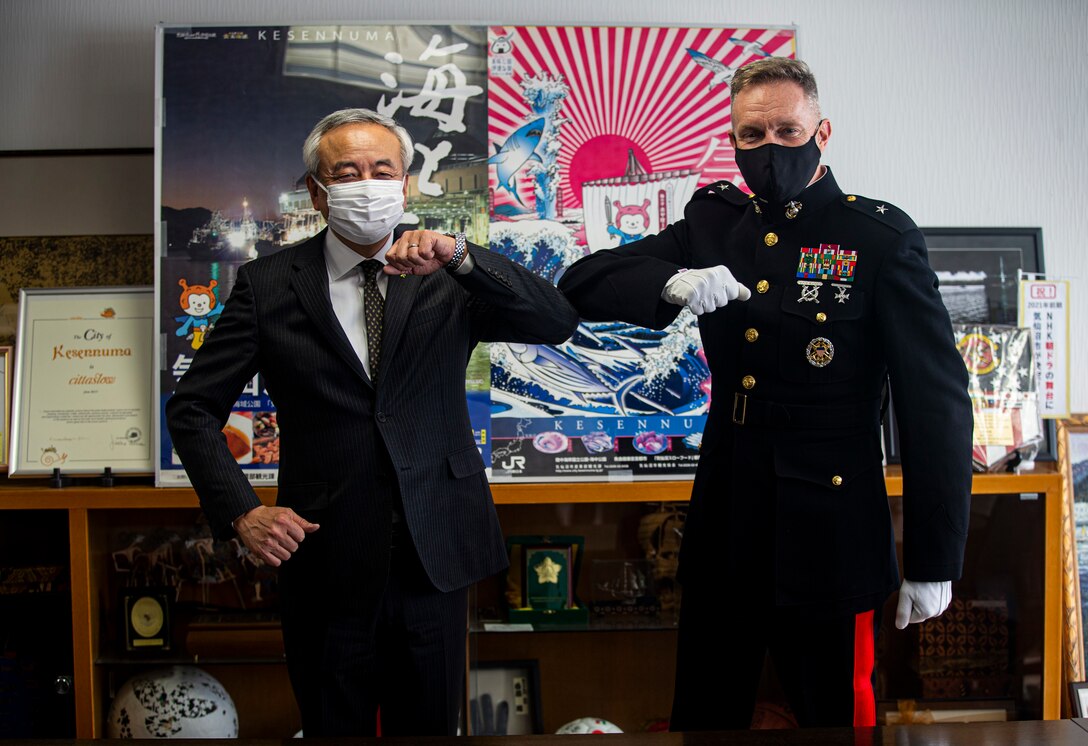 U.S. Marine Corps Brig. Gen. William Bowers, Marine Corps Installations Pacific commanding general, meets with Shigeru Sugawara, the mayor of Kesennuma, at Kesennuma, Japan, March 11, 2021. The meeting discussed the preparations of the 10 year anniversary ceremony of the 2011 Great East Japan earthquake and tsunami disaster in Kesennuma. The U.S. response, Operation Tomodachi, would become the largest Japan-U.S. bilateral operation, involving nearly 25,000 U.S. service members that assisted with aid efforts across the affected areas of Japan. (U.S. Marine Corps photo by Lance Cpl. Alex Fairchild)
