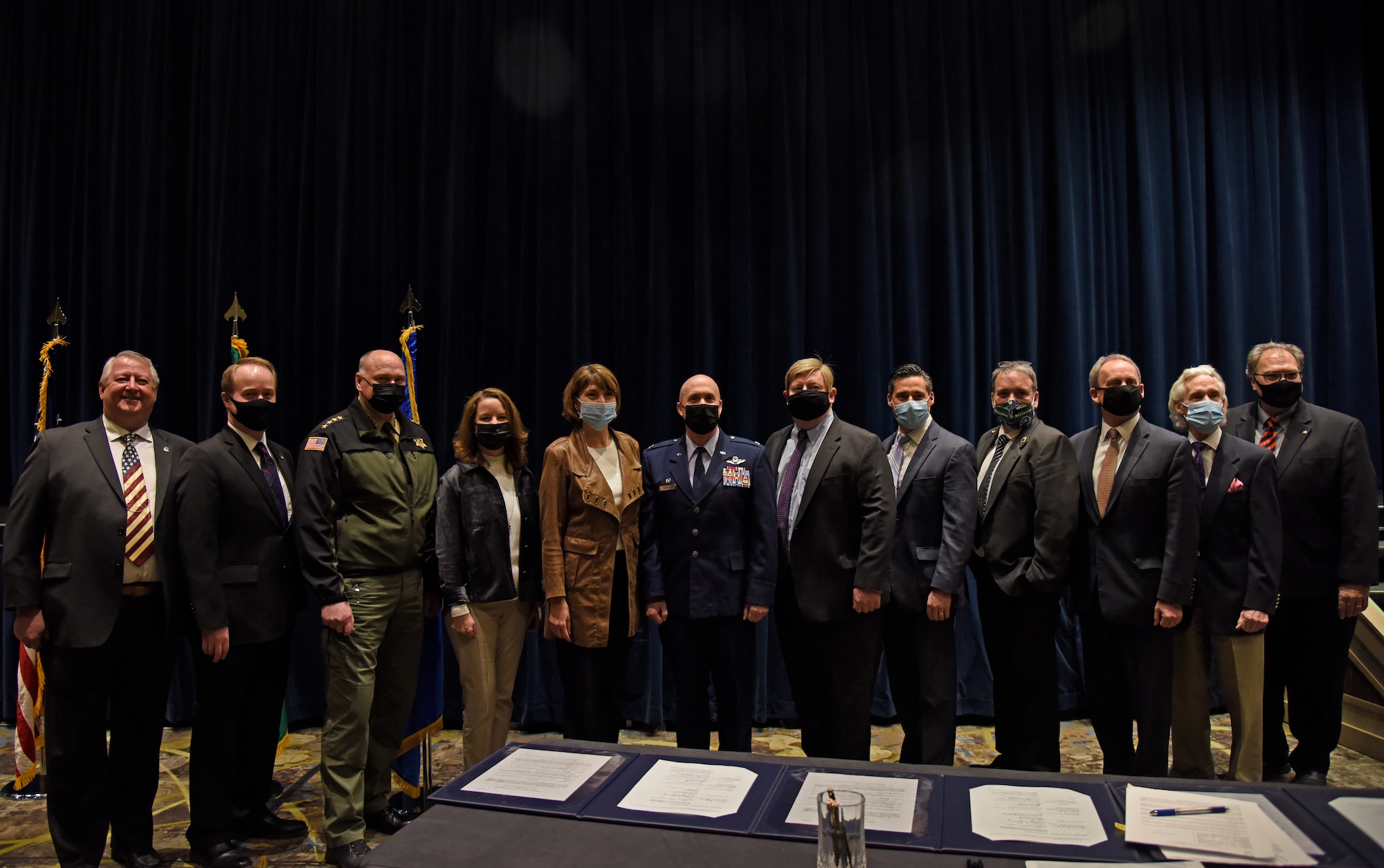 Representatives from Fairchild Air Force Base, the Spokane County Sheriff’s Office, and the Spokane County Board of Commissioners pose for a group photo on March 15, 2021, in Airway Heights, Washington. An event was held to sign a one-of-a-kind Intergovernmental Support Agreement (IGSA) for the Spokane Regional Indoor Small Arms Range Partnership. (U.S. Air Force photo by Staff Sgt. Jesenia Landaverde)