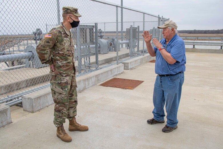 IN THE PHOTO, Memphis District Commander Col. Zachary Miller and other district leaders hosted the Senior Official Performing the Duties of the Assistant Secretary of Army (Civil Works), Mr. Vance Stewart, and USACE's Deputy Commanding General for Civil and Emergency Operations, Maj. Gen. William (Butch) H. Graham, on March 11, 2021. During his tour, Graham stopped by the Grand Prairie Project to learn more about conserving groundwater resources throughout the region and is briefed by subject matter experts on the project and what is needed to complete the project, preserve groundwater, and save life, land and agriculture for many more years to come. (USACE Photo by Vance Harris)