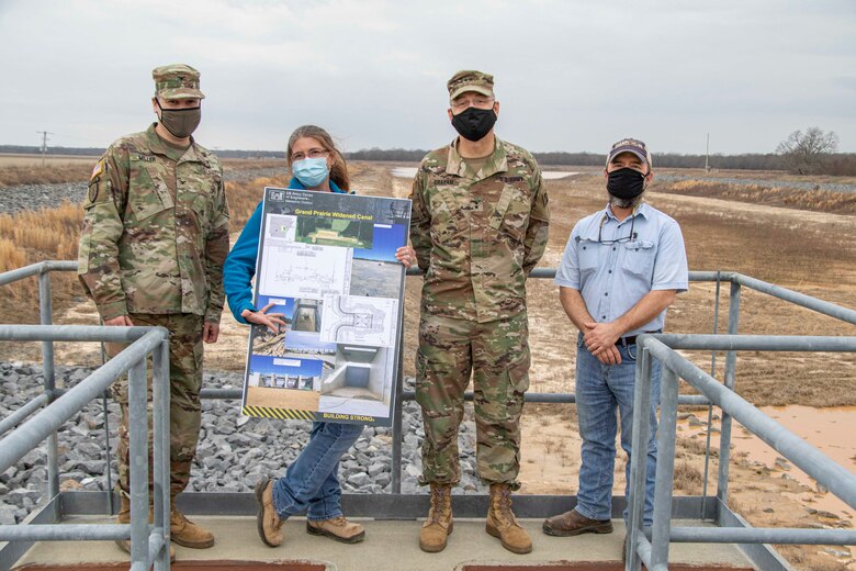 IN THE PHOTO, Memphis District Commander Col. Zachary Miller and other district leaders hosted the Senior Official Performing the Duties of the Assistant Secretary of Army (Civil Works), Mr. Vance Stewart, and USACE's Deputy Commanding General for Civil and Emergency Operations, Maj. Gen. William (Butch) H. Graham, on March 11, 2021. During his tour, Graham stopped by the Grand Prairie Project to learn more about conserving groundwater resources throughout the region and is briefed by subject matter experts on the project and what is needed to complete the project, preserve groundwater, and save life, land and agriculture for many more years to come. (USACE Photo by Vance Harris)