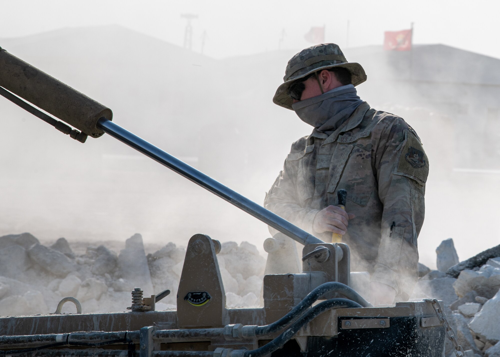 airman mixes concrete