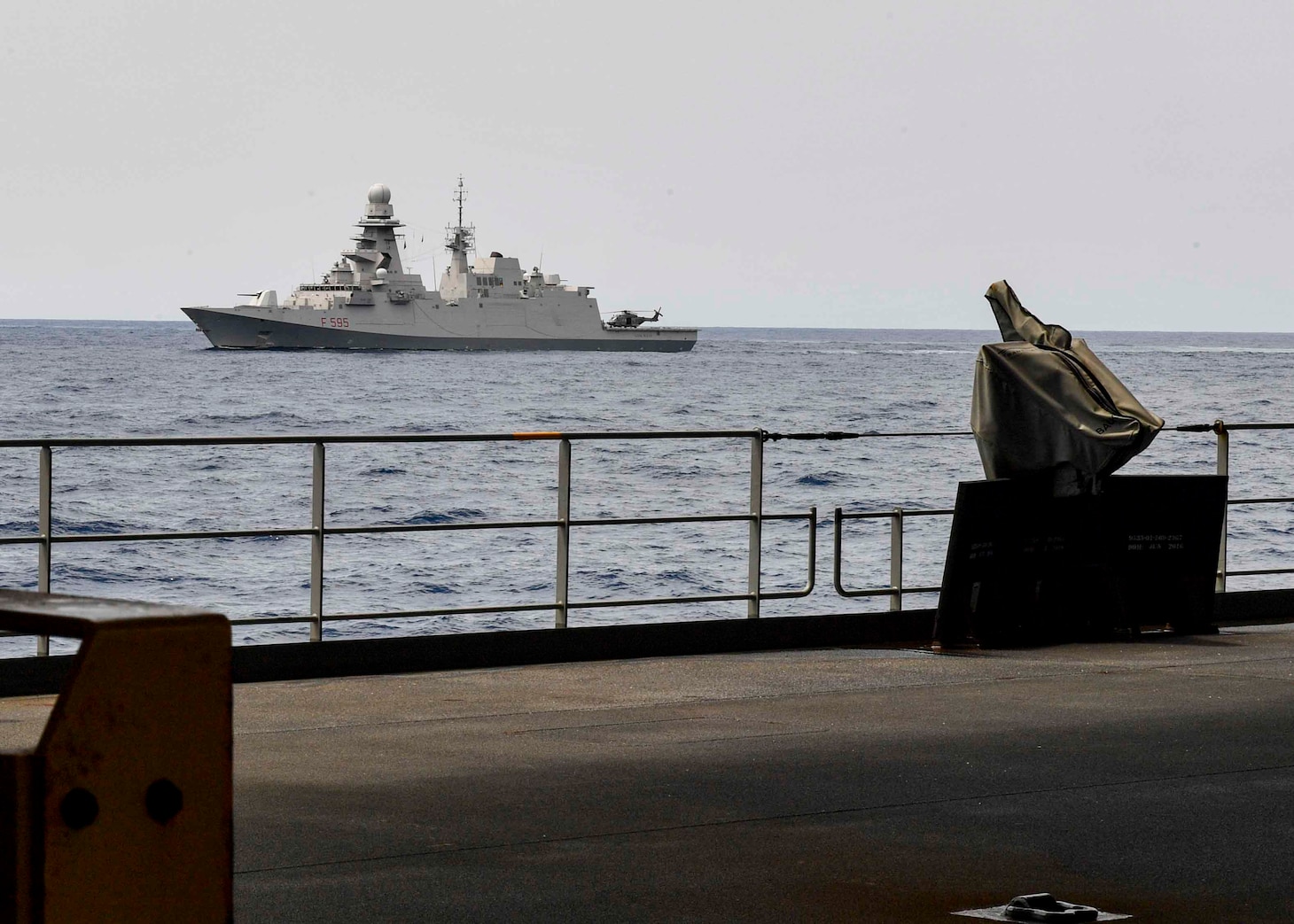 The Italian frigate Luigi Rizzo (F595) steams alongside the Expeditionary Sea Base USS Hershel “Woody” Williams (ESB 4) in the Atlantic Ocean, Mar. 11, 2021. Hershel “Woody” Williams is operating in U.S. Sixth Fleet to conduct interoperability training and build strategic partnerships with their African partners. (U.S. Navy photo by Mass Communication Specialist 2nd Class Eric Coffer/Released)