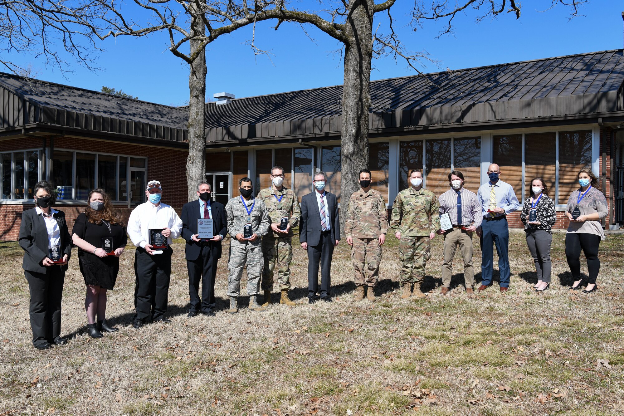 Winners of Arnold Engineering Development Complex annual awards and Air Force Test Center Contracting annual awards pose for a photo with AEDC leadership Feb. 24, 2021, after the awards ceremony at the Arnold Lakeside Complex at Arnold Air Force Base, Tenn. (U.S. Air Force photo by Jill Pickett)