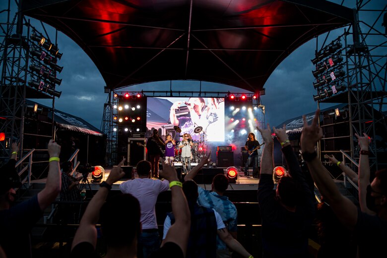 The Koza City Rockers, a rock and roll tribute band, perform during the 2021 Hansen Festival on Camp Hansen, Okinawa, Japan, March 13, 2021. The festival is hosted annually to encourage camaraderie within the U.S. military community through an assortment of food, fun-filled activities and live performances. (U.S. Marine Corps photo by Lance Cpl. Alex Fairchild)