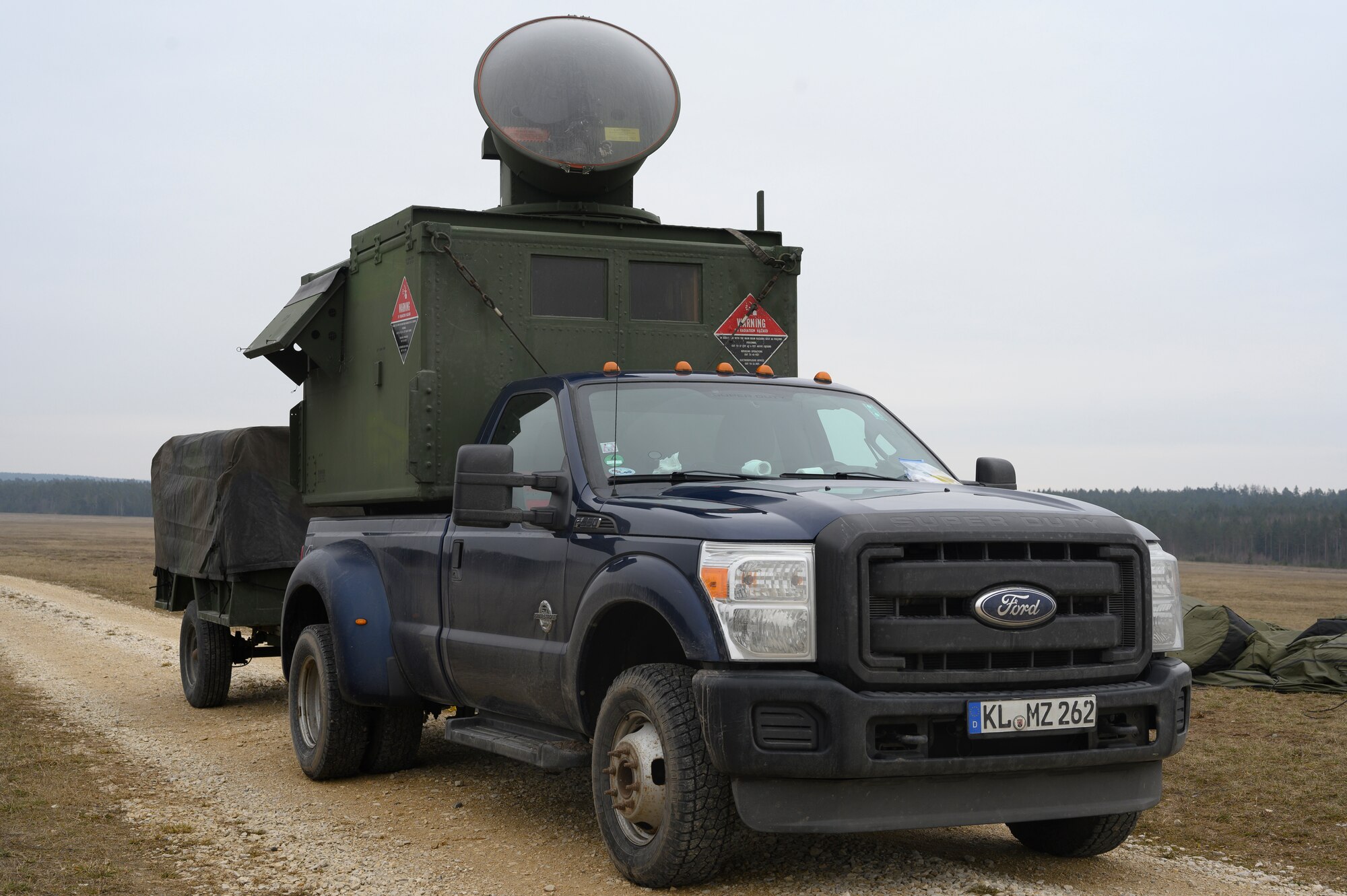 A surface-to-air-threat emitter sits on a government vehicle.