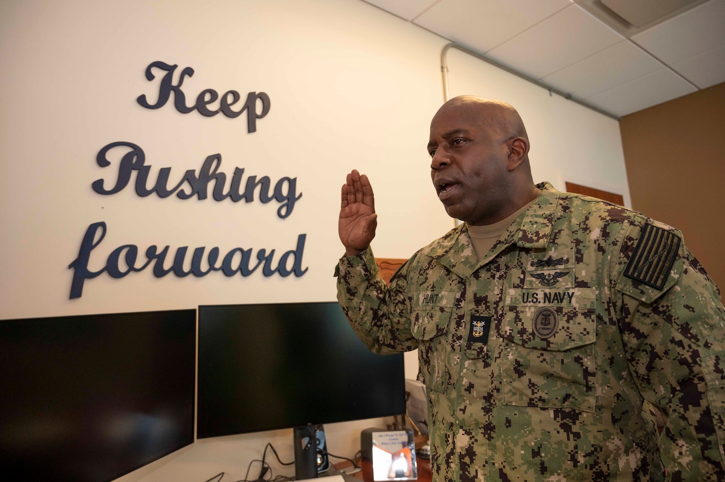 Command Master Chief Tracy Hunt, Commander, Navy Reserve Forces Command (CNRFC), leads enlisted Sailors in reciting the oath of enlistment during a virtual extremism stand-down March 15.