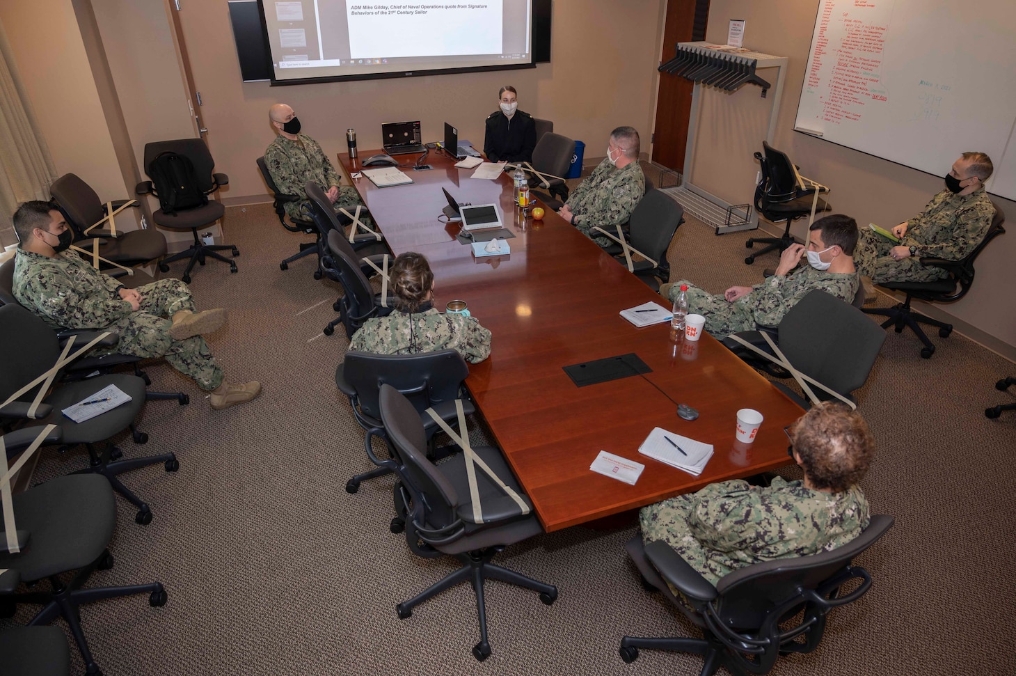Sailors assigned to Commander, Navy Reserve Forces Command attend a socially distanced extremism stand-down discussion.