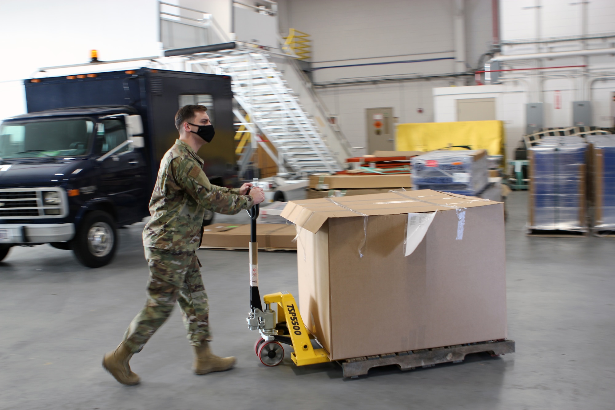 Senior Airman Jacob Milatz, a material management specialist with the 127th Logistics Readiness Squadron, moves a pallet of equipment in a warehouse at Selfridge Air National Guard Base, Mich., Jan. 9, 2020.  (U.S. Air National Guard photo by Master Sgt. Dan Heaton)