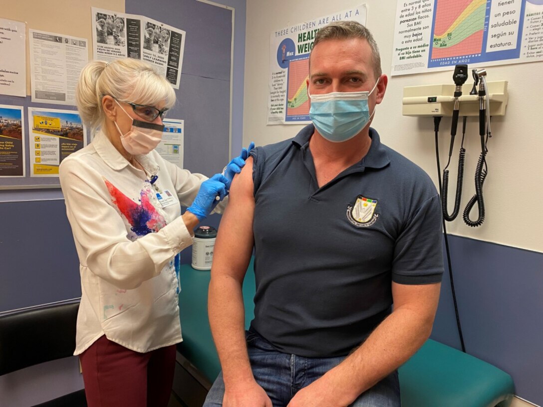 U.S. Marine Brig. Gen. Doug Pierson, Commanding General, 4th Marine Logistics Group, receives the second shot of the Pfizer-BioNTech COVID-19 vaccine at Fort Lewis, WA. on Jan. 15, 2020.