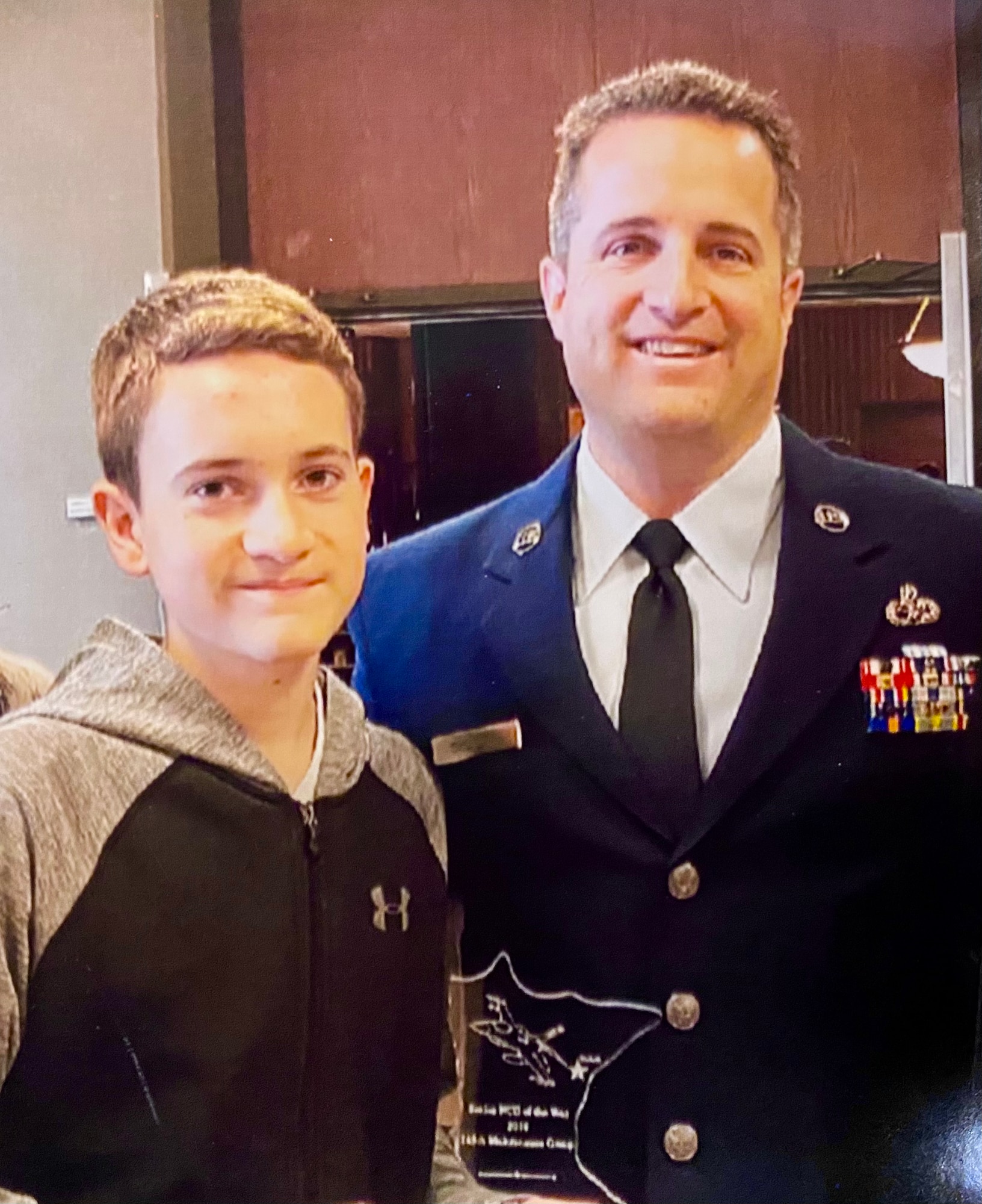 Joey Gigliotti poses for a photo with his father, Chief Master Sgt. Ryan Gigliotti. Joey Gigliotti is the third generation of his family to serve in the Air National Guard. (Courtesy Photo)