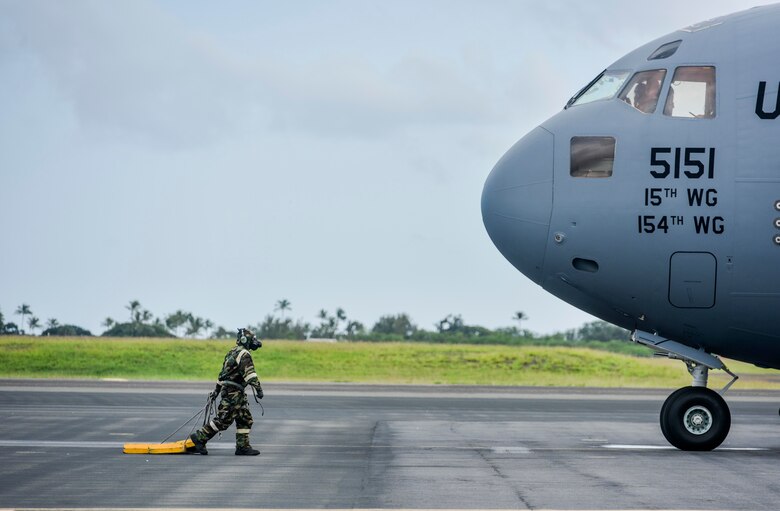 A C-17 Globemaster III prepares to fly a mission to Kauai during Exercise TROPIC FURY at Joint Base Pearl Harbor-Hickam, Hawaii, March 11, 2021. The inherent flexibility and performance of the C-17 force improves the ability of the total airlift system to fulfill the worldwide air mobility requirements of the United States. (U.S. Air Force photo by Tech. Sgt. Anthony Nelson Jr.)