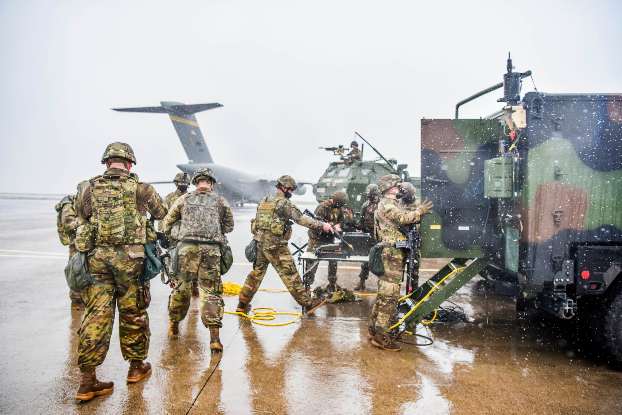 Soldiers with Alpha Battery, 5th Battalion, 3rd Field Artillery Regiment, 17th Field Artillery Brigade assigned to Joint Base Lewis-McChord participates in Exercise TROPIC FURY at Pacific Missile Range Facility Barking Sands, Hawaii, March 12, 2021. FA17 trained soldiers to fire the High Mobility Artillery Rocket System that can achieve a range of 70-plus kilometers. 

 (U.S. Air Force photo by Tech. Sgt. Anthony Nelson Jr.)