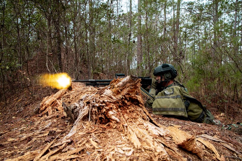 Netherlands Marine Corps Marine Class 1 Joey with 32nd Raiding Squadron fires an M240B machine gun during Exercise Caribbean Urban Warrior on Camp Lejeune, N.C., March 15, 2021. The exercise is a bilateral training evolution designed to increase global interoperability between 2d Reconnaissance Battalion, 2d Marine Division and 32nd Raiding Squadron, Netherlands Marine Corps. (U.S. Marine Corps photo by Lance Cpl. Jacqueline Parsons)