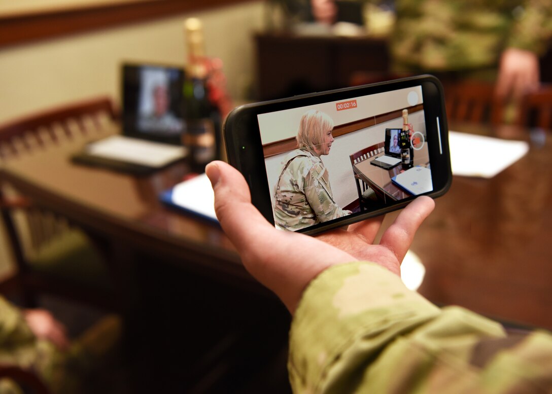 U.S. Air Force Chief Master Sgt. Casey Boomershine, 17th Training Wing command chief, virtually presents Master Sgt. Erica Pratt, 17th Training Group operations superintendent, her selection to promote to Senior Master Sgt. at the Norma Brown building on Goodfellow Air Force Base, Texas, March 15, 2021.  Pratt, who was TDY attending First Sergeant Academy, was completely surprised with the news of her promotion. (U.S. Air Force photo by Senior Airman Abbey Rieves)