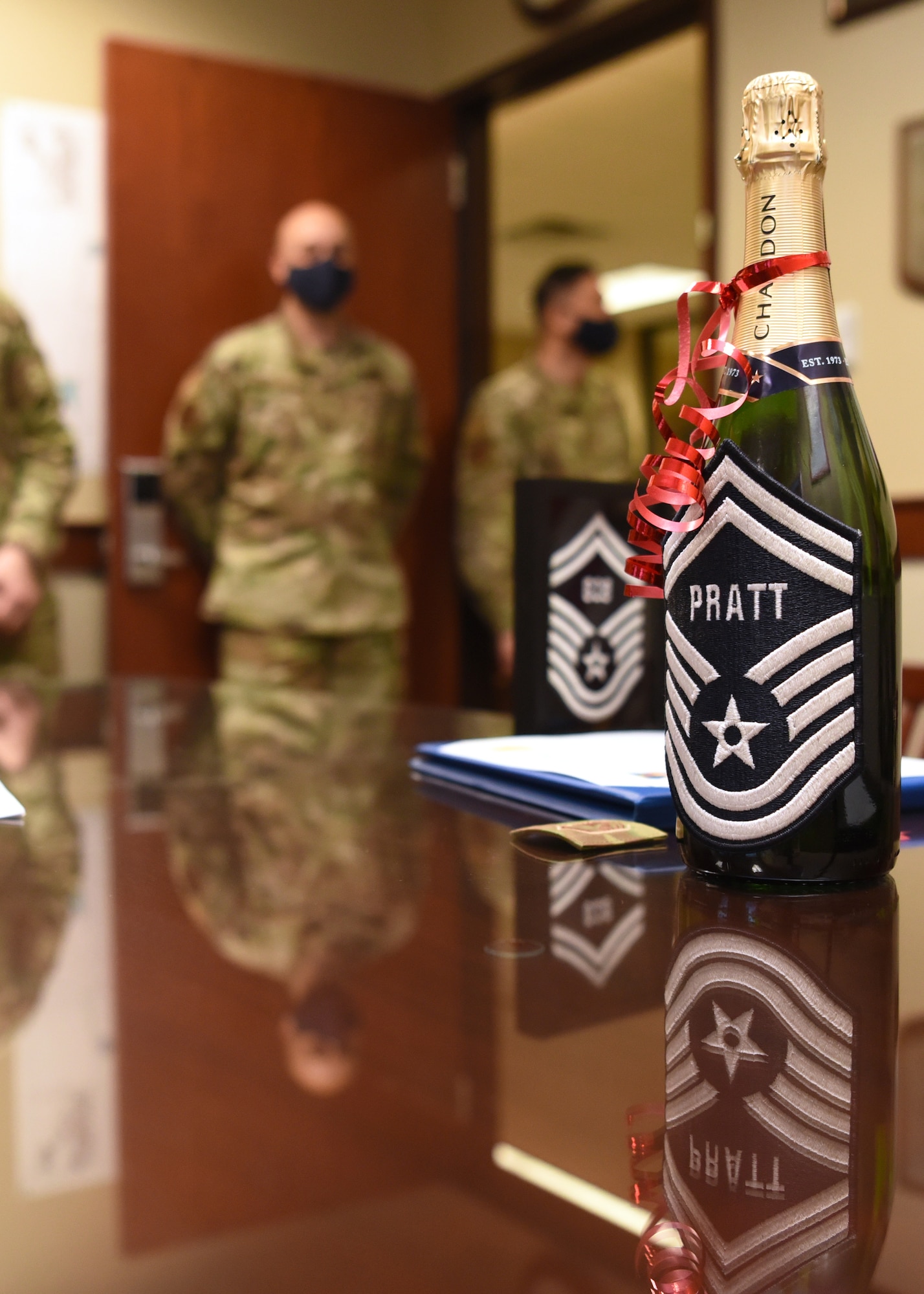 A Senior Master Sgt. selectee’s congratulatory gift is on a table in the Norma Brown building on Goodfellow Air Force Base, Texas, March 15, 2021.  Out of 17,107 individuals eligible for promotion this year, only 1,194 individuals were selected for the rank of Senior Master Sgt. (U.S. Air Force photo by Senior Airman Abbey Rieves)