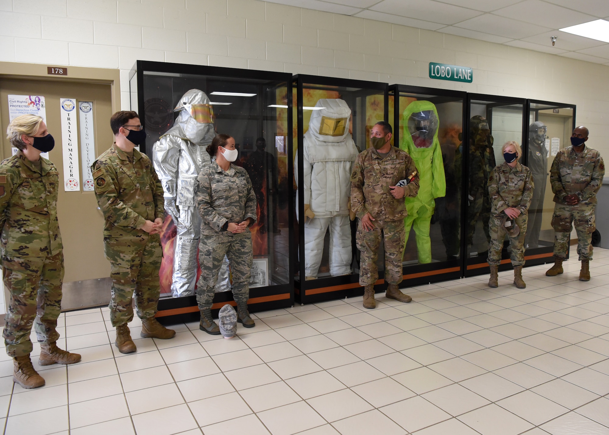 U.S. Air Force Master Sgt. Kevin Johnson, 312th Training Squadron first sergeant, receives his selectee notification for promotion to Senior Master Sgt. while surrounded by supporting comrades in the 312th TRS schoolhouse, on Goodfellow Air Force Base, Texas, March 15, 2021. Johnson was one out of only two members on Goodfellow to be selected for promotion and the promotion rate this year was less than 7% in the Air Force. (U.S. Air Force photo by Senior Airman Abbey Rieves)