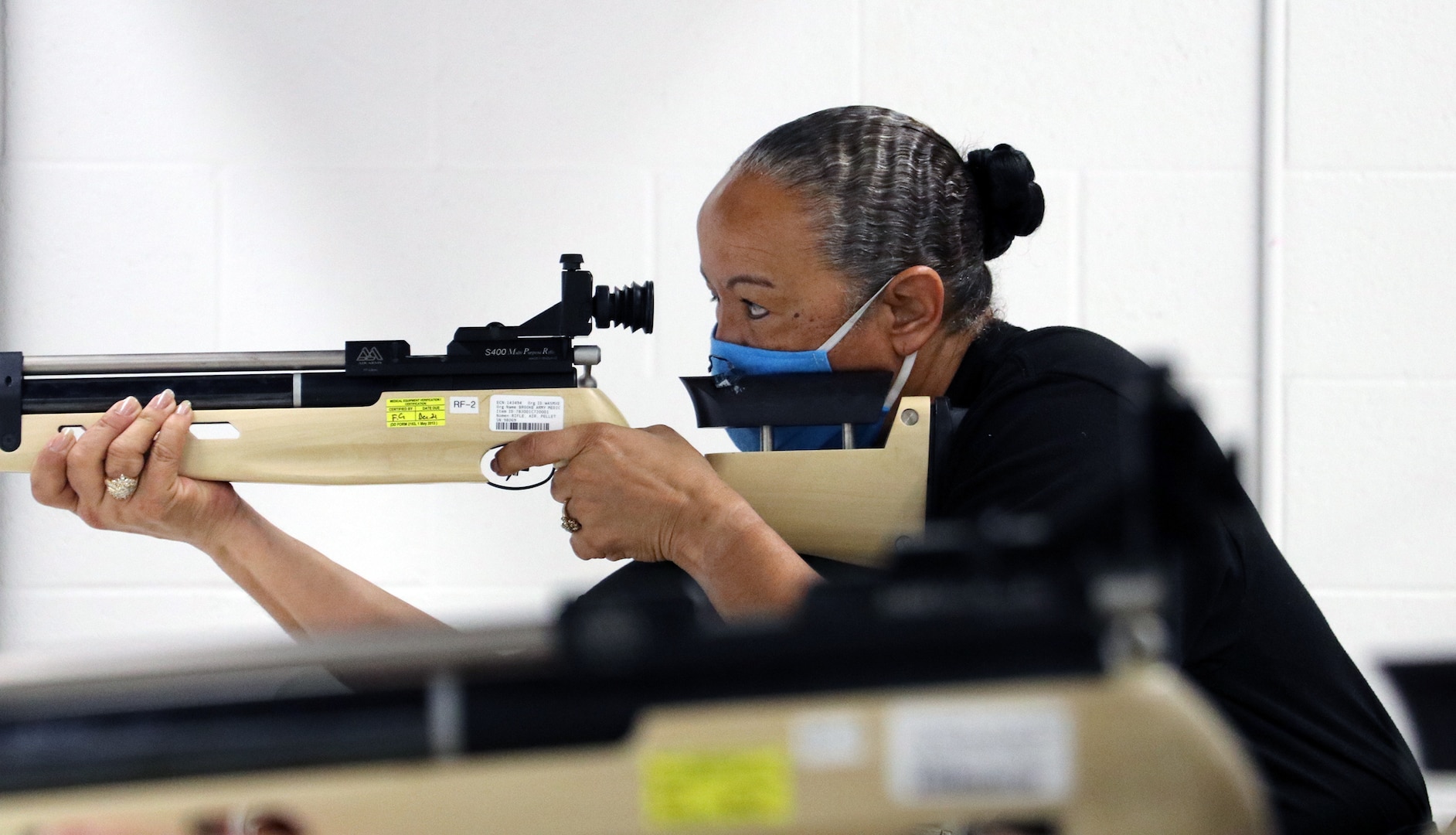 U.S. Army Master Sgt. Mary Jackson, Soldier Recovery Unit, Brooke Army Medical Center, works on breathing techniques while taking practice shots in preparation for the Virtual Army Trials air rifle event at Cole High School at Joint Base San Antonio-Fort Sam Houston March 4. Jackson and several other BAMC SRU Soldiers are vying for selection to Team Army to compete in the DoD Warrior Games in September.