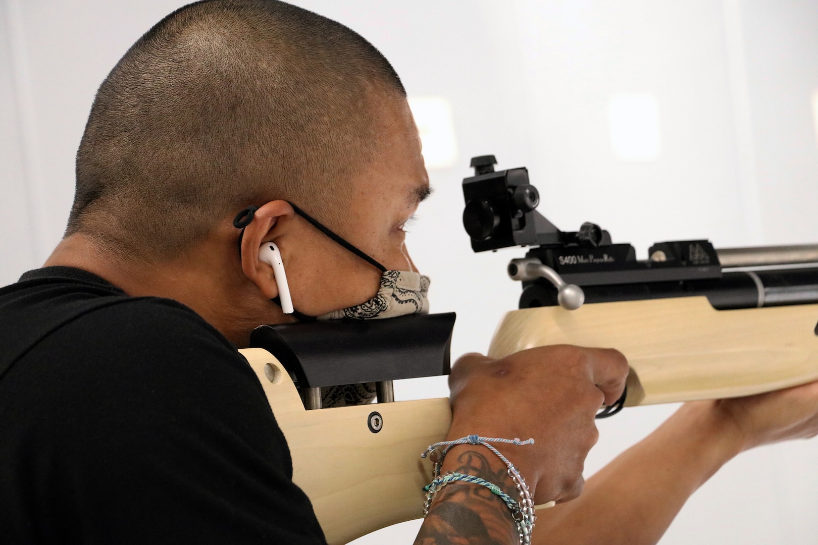 U.S. Army Staff Sgt. Gene Calantoc, Soldier Recovery Unit, Brooke Army Medical Center, takes careful aim during the Virtual Army Trials air rifle event at Cole High School at Joint Base San Antonio-Fort Sam Houston March 4. Calantoc and several other BAMC SRU Soldiers are vying for selection to Team Army to compete in the Department of Defense Warrior Games in September.