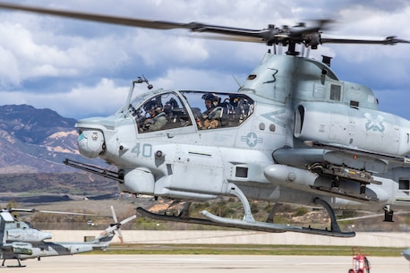 U.S. Marine Maj. Gen. Christopher Mahoney, the commanding general of 3rd Marine Aircraft Wing, lands an AH-1Z Viper helicopter on Marine Corps Air Station Camp Pendleton, California, March 12, 2021. Mahoney visited the air station to observe operations and speak to Marines with Marine Light Attack Helicopter Squadron 369, Marine Aircraft Group 39, 3rd MAW. In line with Marine Corps Force Design 2030, 3rd MAW continues to refine combat capabilities in all of its aircraft types. The AH-1Z Viper brings a flexible combination of lethal close fires along with littoral scouting and reconnaissance capabilities. (U.S. Marine Corps photo by Lance Cpl. Drake Nickels)