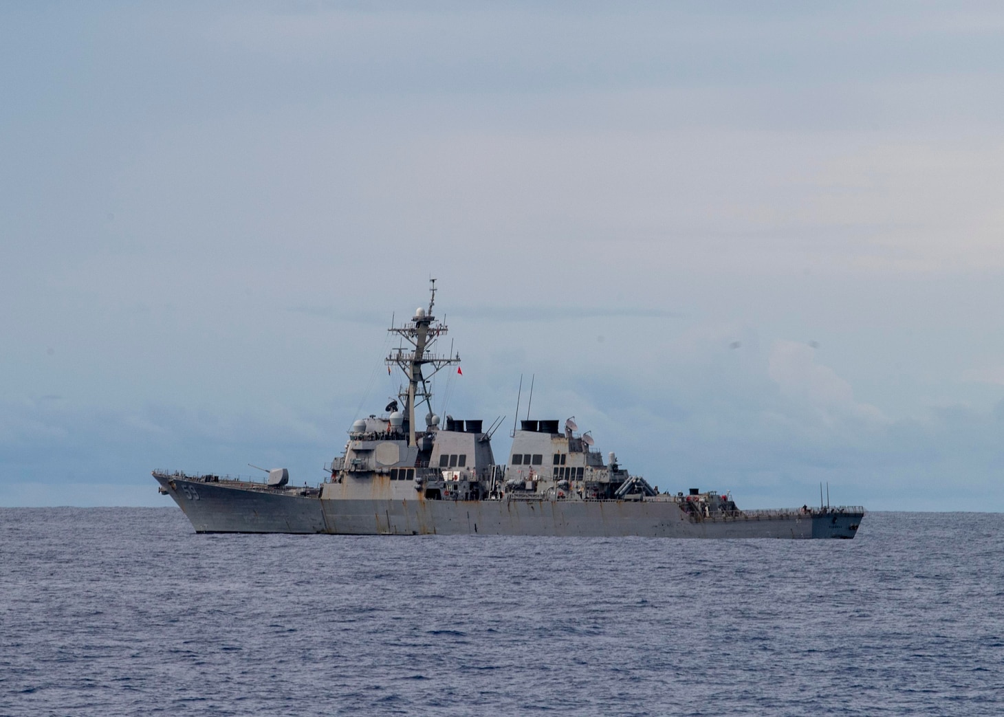 INDIAN OCEAN (March 12, 2021) The Arleigh Burke-class guided-missile destroyer USS Russell (DDG 59) transits the Indian Ocean during a surface target exercise March 12, 2021. Russell, part of the Theodore Roosevelt Carrier Strike Group, is on a scheduled deployment to the U.S. 7th Fleet area of operations. As the U.S. Navy’s largest forward-deployed fleet, 7th Fleet routinely operates and interacts with 35 maritime nations while conducting missions to preserve and protect a free and open Indo-Pacific Region. (U.S. Navy photo by Mass Communication Specialist 2nd Class Brandie Nuzzi)