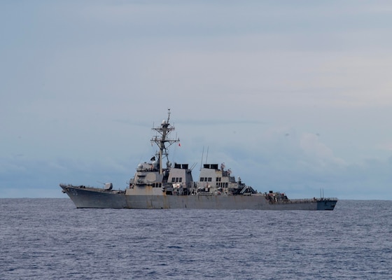 INDIAN OCEAN (March 12, 2021) The Arleigh Burke-class guided-missile destroyer USS Russell (DDG 59) transits the Indian Ocean during a surface target exercise March 12, 2021. Russell, part of the Theodore Roosevelt Carrier Strike Group, is on a scheduled deployment to the U.S. 7th Fleet area of operations. As the U.S. Navy’s largest forward-deployed fleet, 7th Fleet routinely operates and interacts with 35 maritime nations while conducting missions to preserve and protect a free and open Indo-Pacific Region. (U.S. Navy photo by Mass Communication Specialist 2nd Class Brandie Nuzzi)