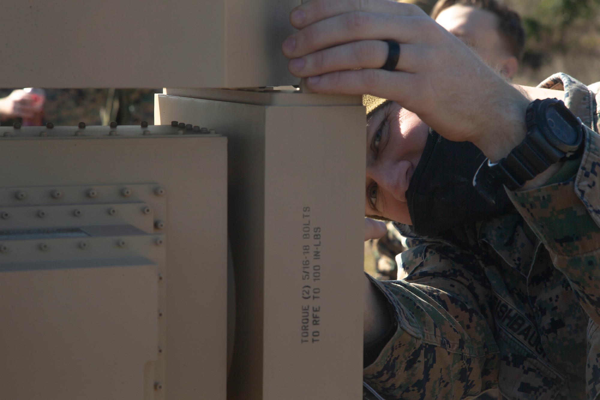 A marine looks at the camera during the  2nd Intelligence Battalion Field Exercise.