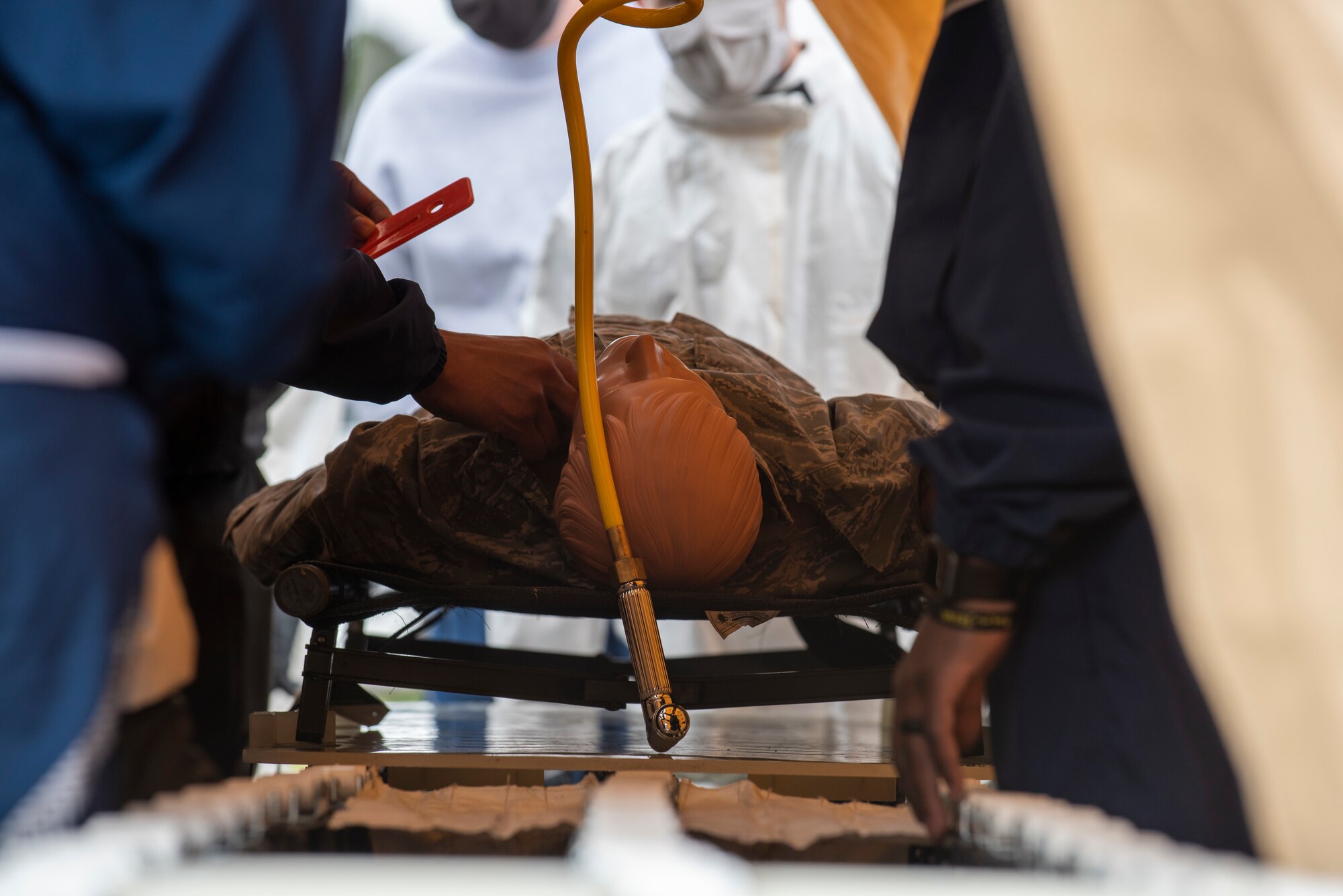 4th Medical Group Airmen participate in chemical decon training.