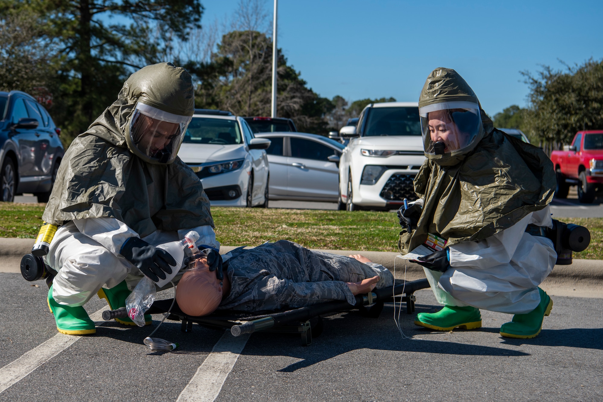 4th Medical Group Airmen participate in chemical decon training.