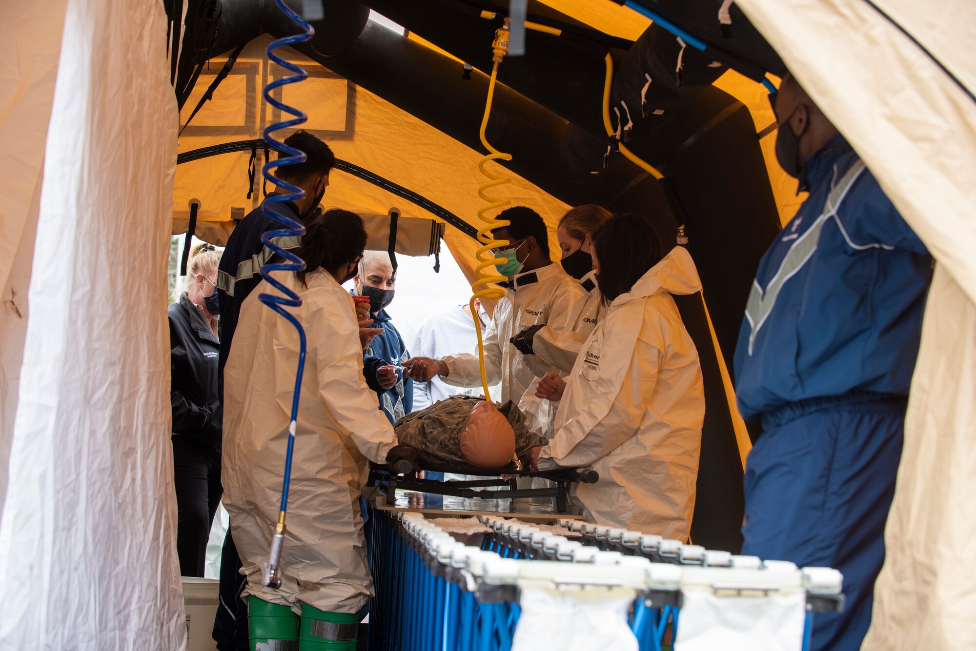 4th Medical Group Airmen participate in chemical decon training.