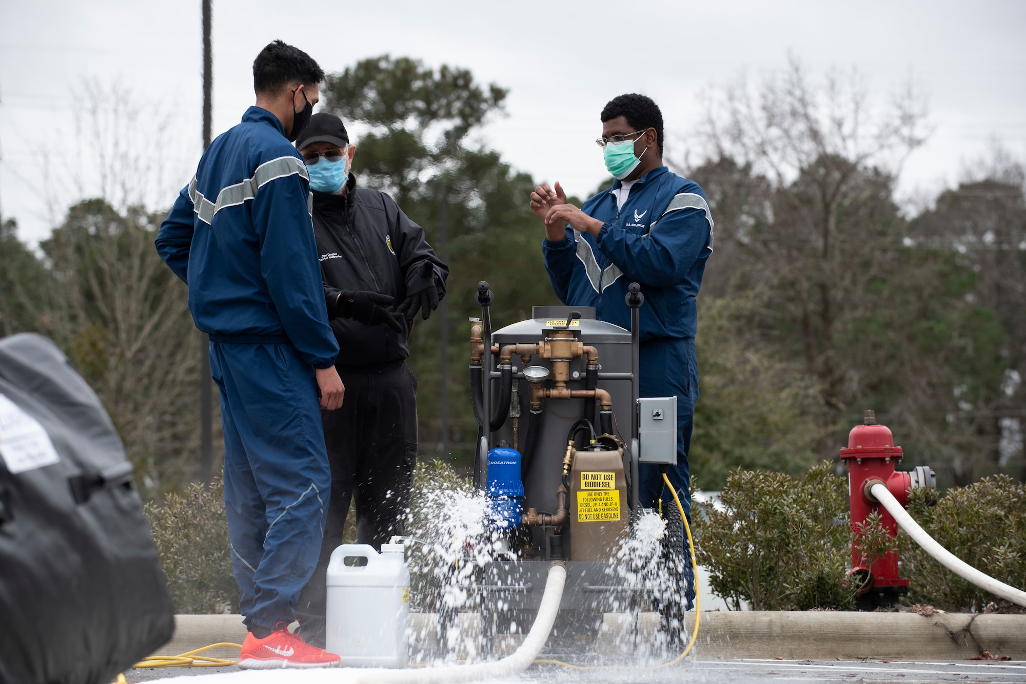 4th Medical Group Airmen participate in chemical decon training.