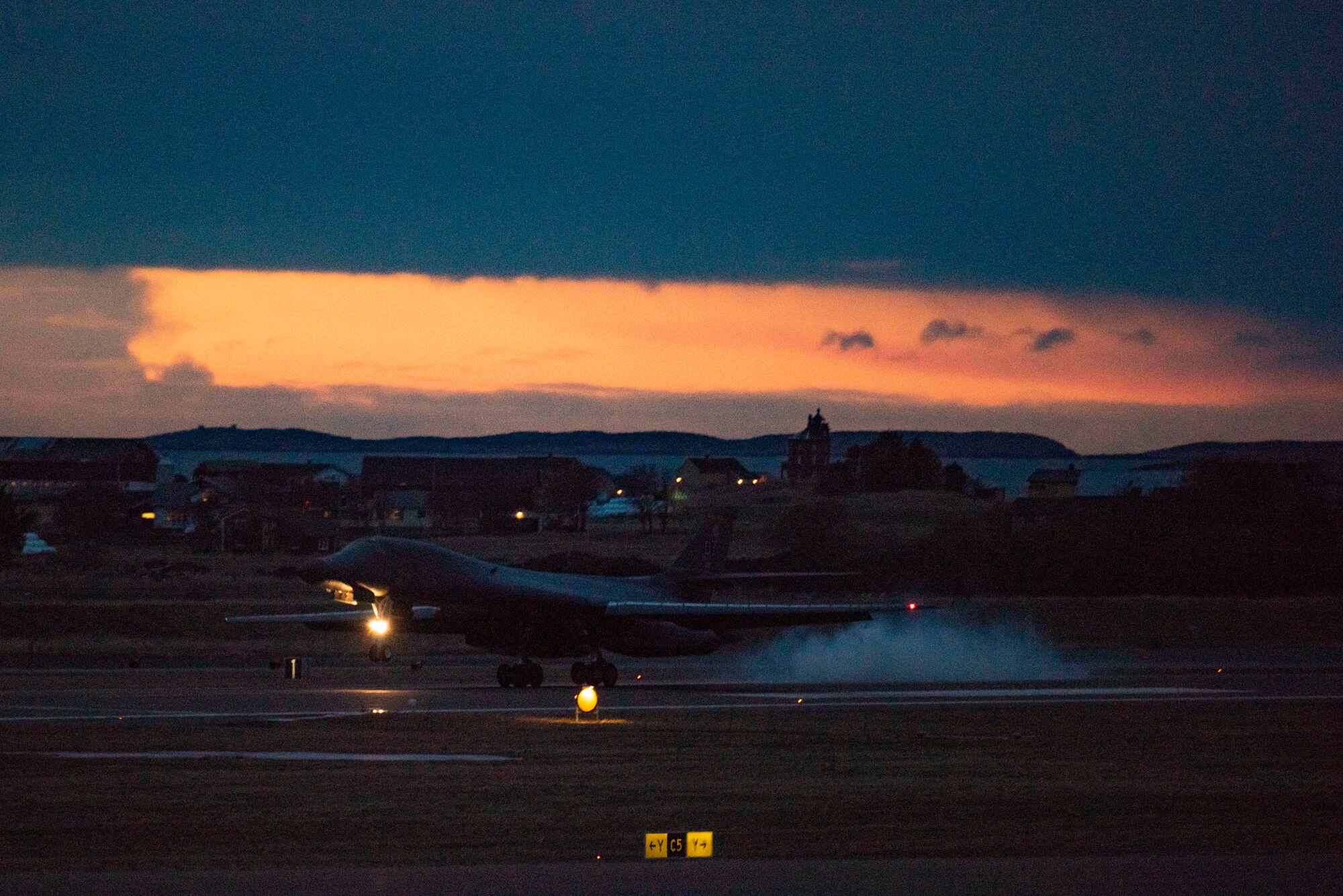 A B-1B Lancer assigned to the 9th Expeditionary Bomb Squadron lands at Ørland Air Force Station, Norway, March 12, 2021. The B-1 integrated with ally and partner fighter aircraft and Joint Terminal Attack Controllers during a Bomber Task Force Europe training mission, Spring Spear. (U.S. Air Force photo by Airman 1st Class Colin Hollowell)