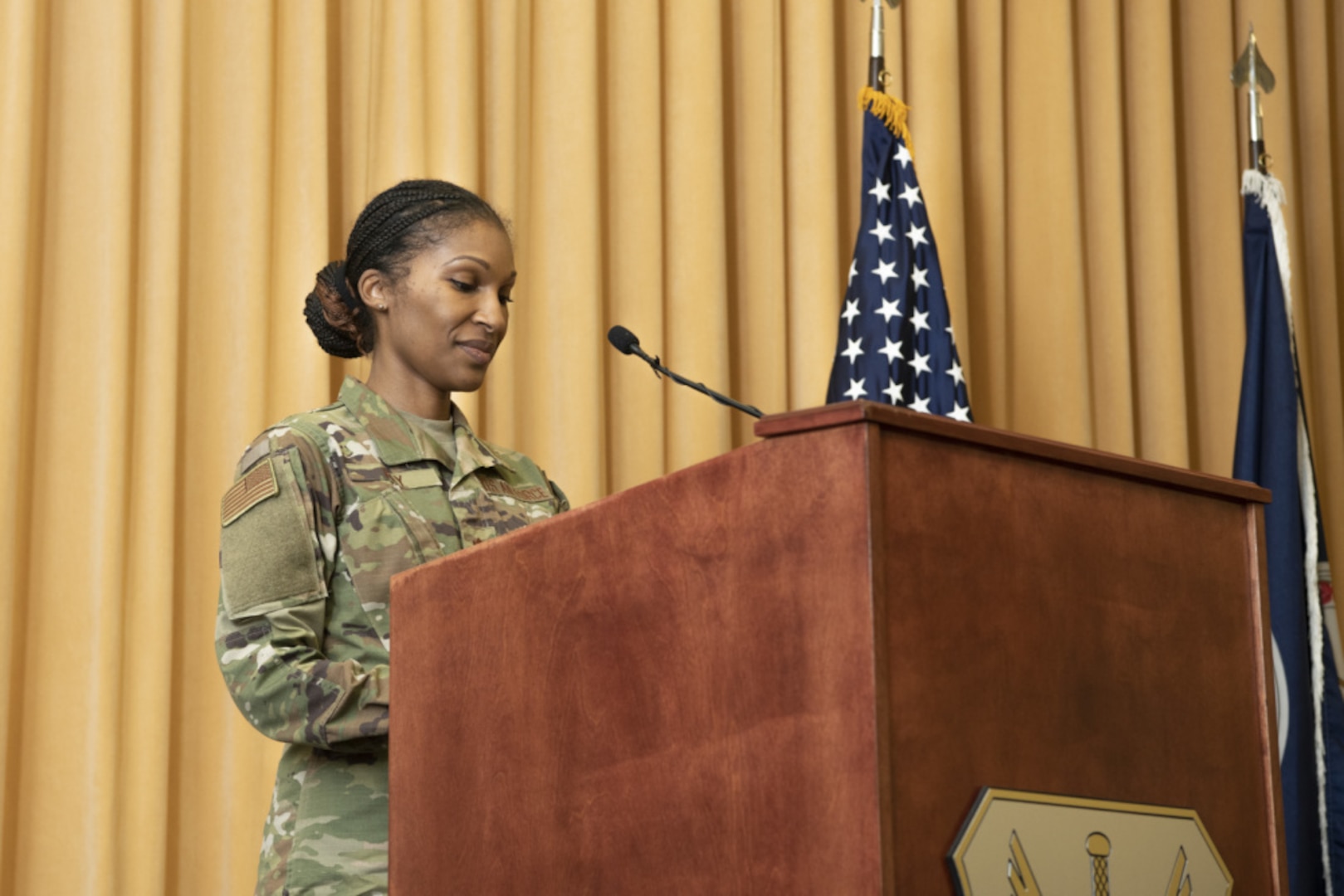 Airmen stand at a attention