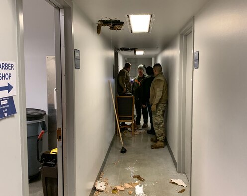 People standing in a hallway