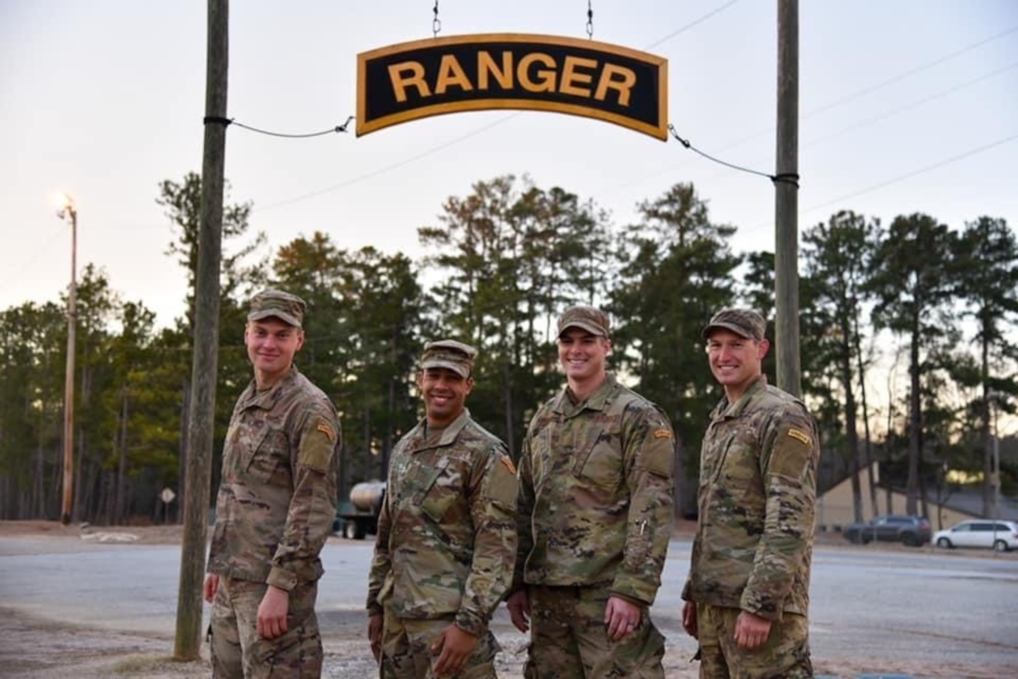 Senior Airman Jonathan Petersen (second from left), 103rd Maintenance Squadron electrical and environmental systems specialist, poses for a picture with the three other total force Airmen in his U.S. Army Ranger School graduating class at Fort Benning, Georgia, Feb. 4, 2021. Petersen attended U.S. Army Ranger School through the Air National Guard's Enlisted Development Opportunities program, and was the only Air National Guardsman in his graduating class. (Courtesy photo)
