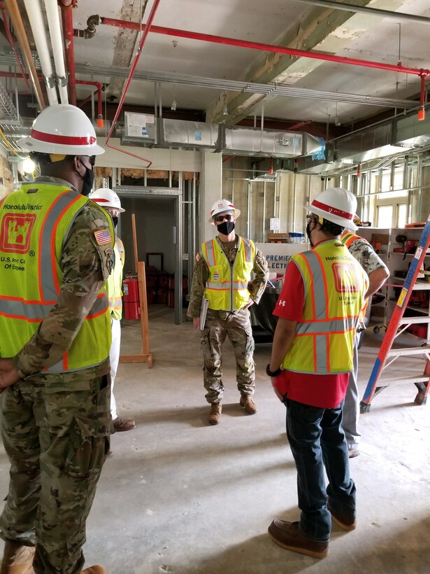 SCHOFIELD BARRACKS (Dec. 10, 2020) -- Honolulu District Commander Lt. Col.. Eric Marshall discusses construction progress with the District's Schofield Barracks Quad B Bldg. 155 renovation project team during