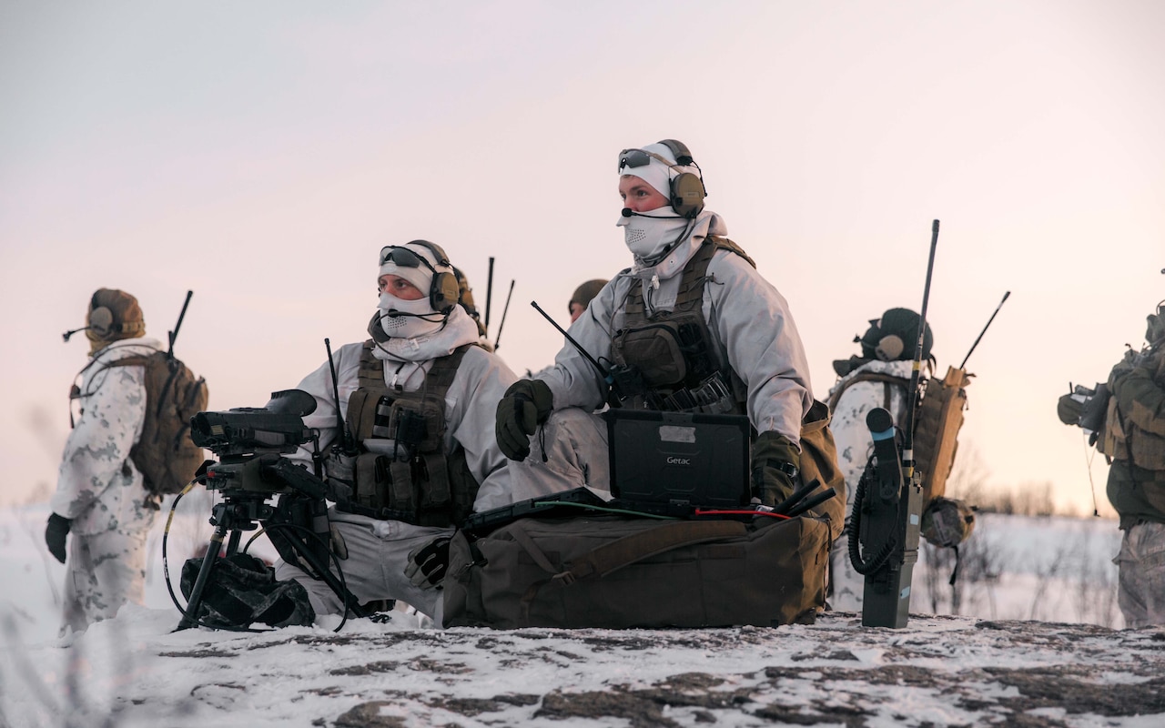 Troops operate in the snow.