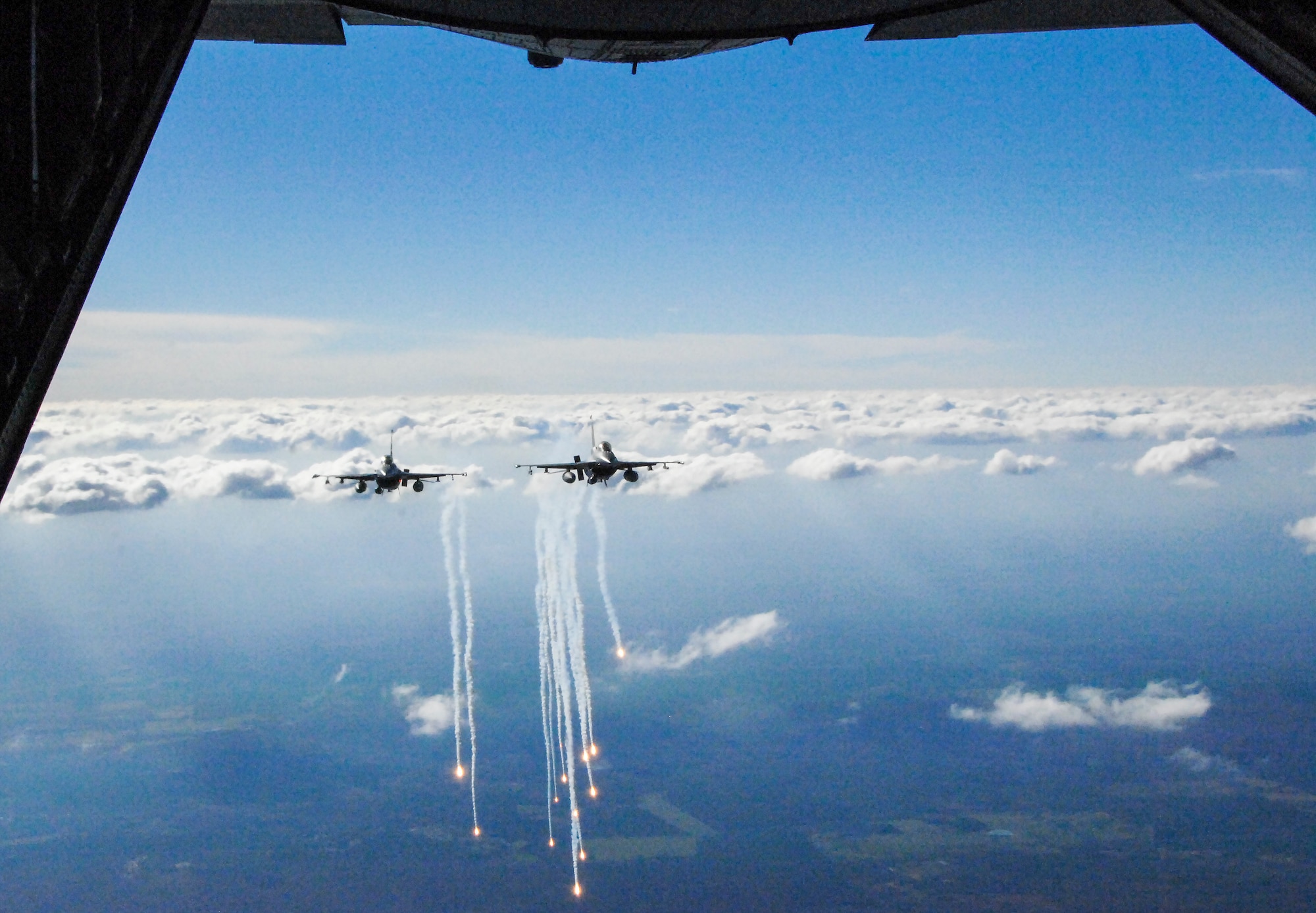 Two F-16s fly in formation