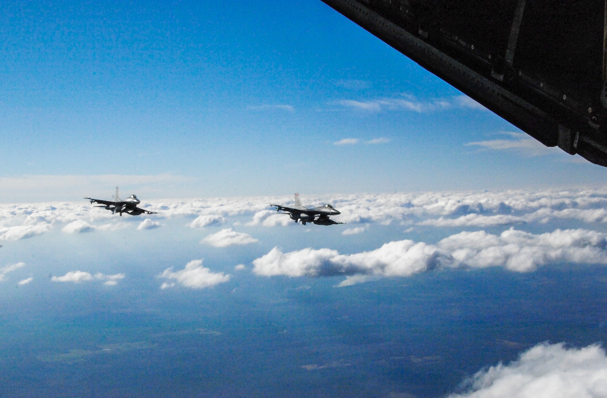 Two F-16s fly in formation