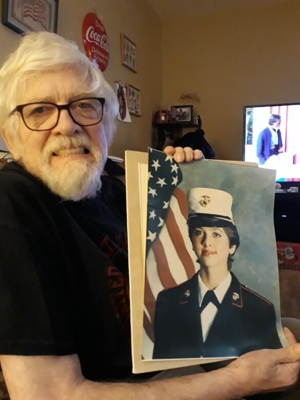 Lt. Col. Sally Ann Falco's father, Kenneth Townes, holds a photo of Falco taken while she was at recruit training in 1987 at Marine Corps Recruit Depot Parris Island, South Carolina. Falco served as an enlisted Marine for 14 years before her acceptance to the Meritorious Commissioning Program. She commissioned in August 2001 and will soon retire after 34 fruitful years in the Marine Corps. “I’ve just been privileged to be allowed to be a Marine,” Falco said. “I still love it as much as the day I came in, and I would stay in forever, but I want to make room for others to climb the ladder and at the same time, contribute to society in another capacity.” (Courtesy photo by Falco's mother, Loretta "Tootsie" Townes)