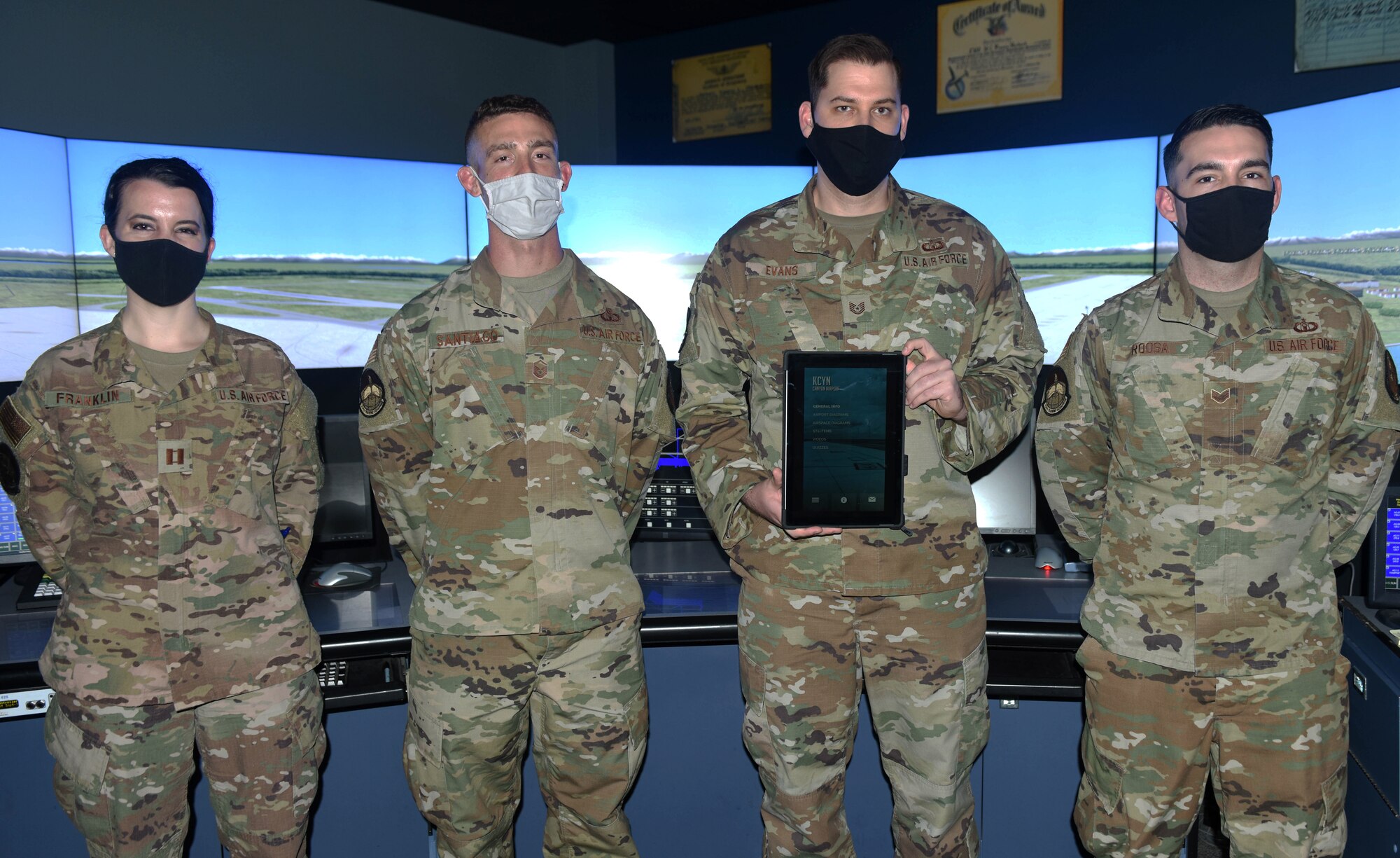 The Air Education and Training Command Air Traffic Control Pocket App team pose for a photo inside Cody Hall at Keesler Air Force Base, Mississippi, March 15, 2021. The team first created the app to help future Air Traffic Control students study outside of class and hope to achieve funding through the Spark Tank program. (U.S. Air Force photo by Airman 1st Class Jasmine Galloway)