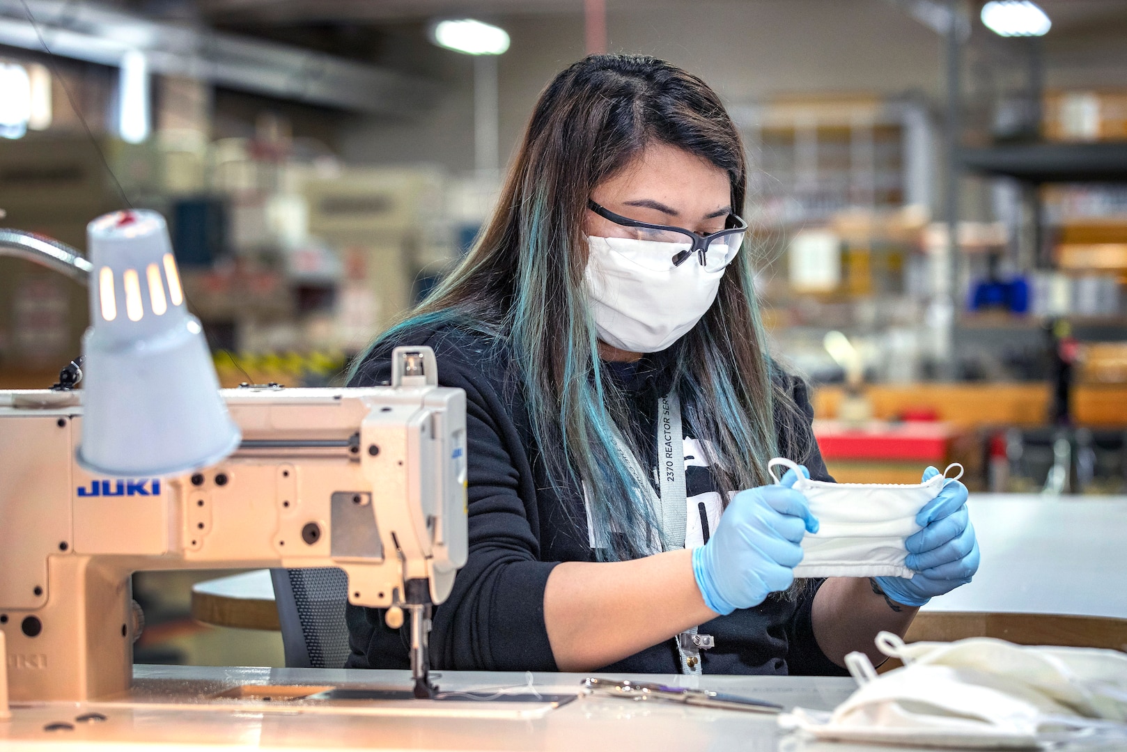 Shop 64 fabric workers at Puget Sound Naval Shipyard & Intermediate Maintenance Facility in Bremerton, Washington, make cloth masks and polycarbonate face shields that can be used to protect the workforce, or provided to Naval Hospital Bremerton and local hospitals if the need arises.