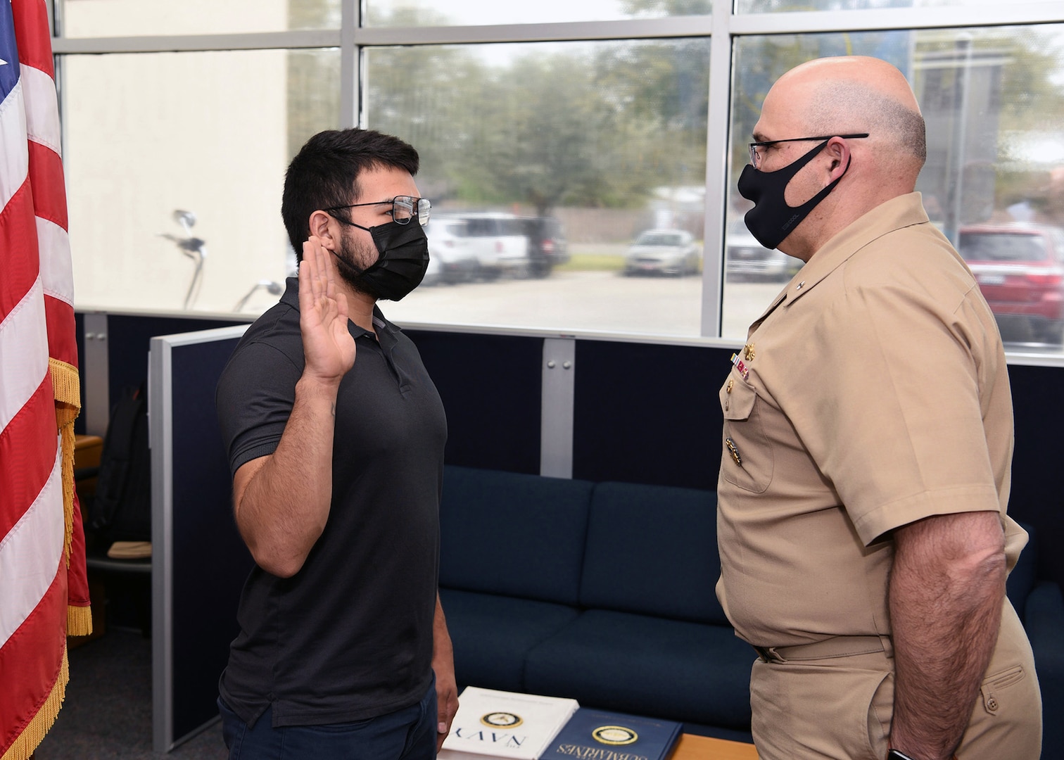 While visiting Navy Recruiting Station McAllen, Rear Adm. Dennis Velez, commander, Navy Recruiting Command swore in future Sailor Eli DeLossantos, 22, of Edinburg, Texas, into America’s Navy March 11. DeLossantos, a 2017 graduate of Donna North High School in Donna, Texas, will serve as an electrician’s mate and is scheduled to ship to recruit training in August.