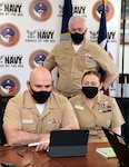 Rear Adm. Dennis Velez, commander, Navy Recruiting Command (NRC), joined by Command Master Chief Rick Moreyra, and National Chief Recruiter Master Chief Navy Counselor Heather Charara, speak via video conference to more than 220 Sailors and support personnel assigned to Navy Talent Acquisition Group San Antonio during an All Hands Call at NTAG headquarters.