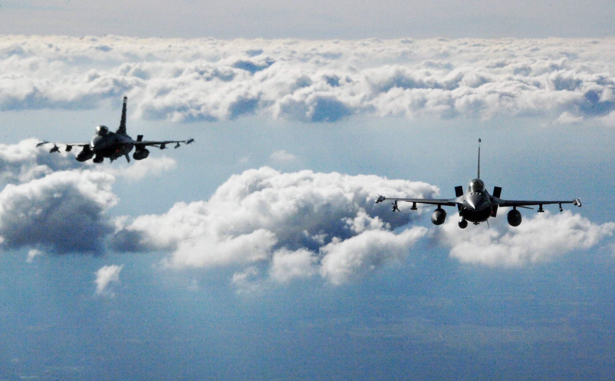 Two F-16s fly in formation