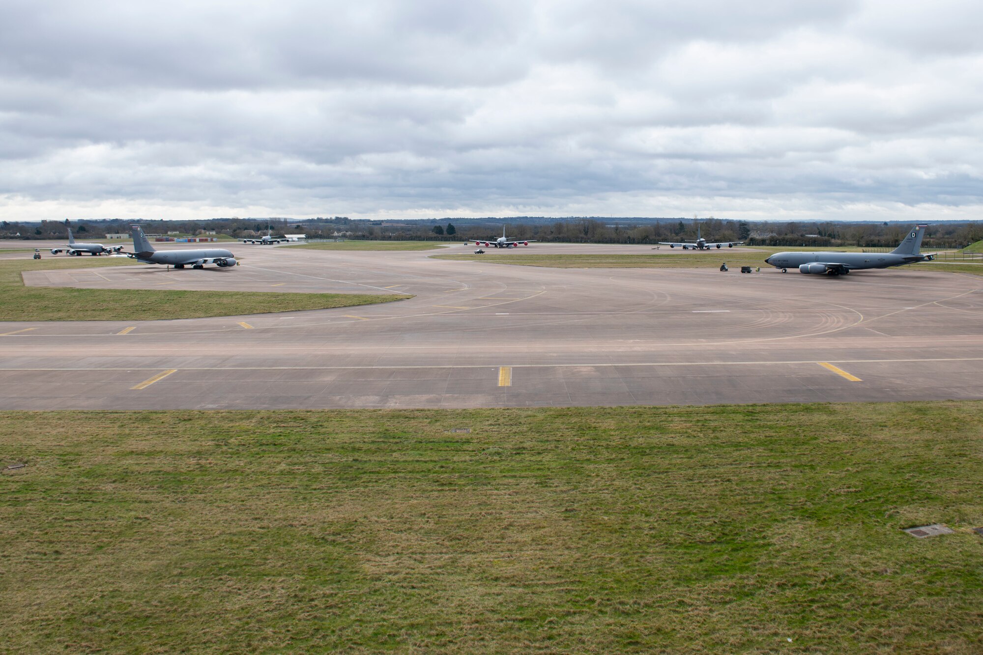 Seven U.S. Air Force KC-135 Stratotanker aircraft assigned to the 100th Air Refueling Wing, stand at Royal Air Force Fairford, England, during the Baltic Trident Exercise, March 15, 2021. U.S. forces in Europe continuously strengthen our alliances and partnerships to create a networked security architecture capable of deterring aggression and maintaining stability. (U.S. Air Force photo by Senior Airman Jennifer Zima)